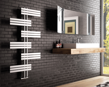 Bathroom with black brick wall, wooden vanity, and modern Cordivari Babyla towel radiator.