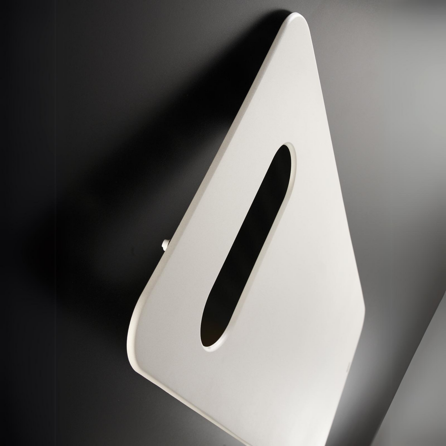 White radiator on a dark gray background