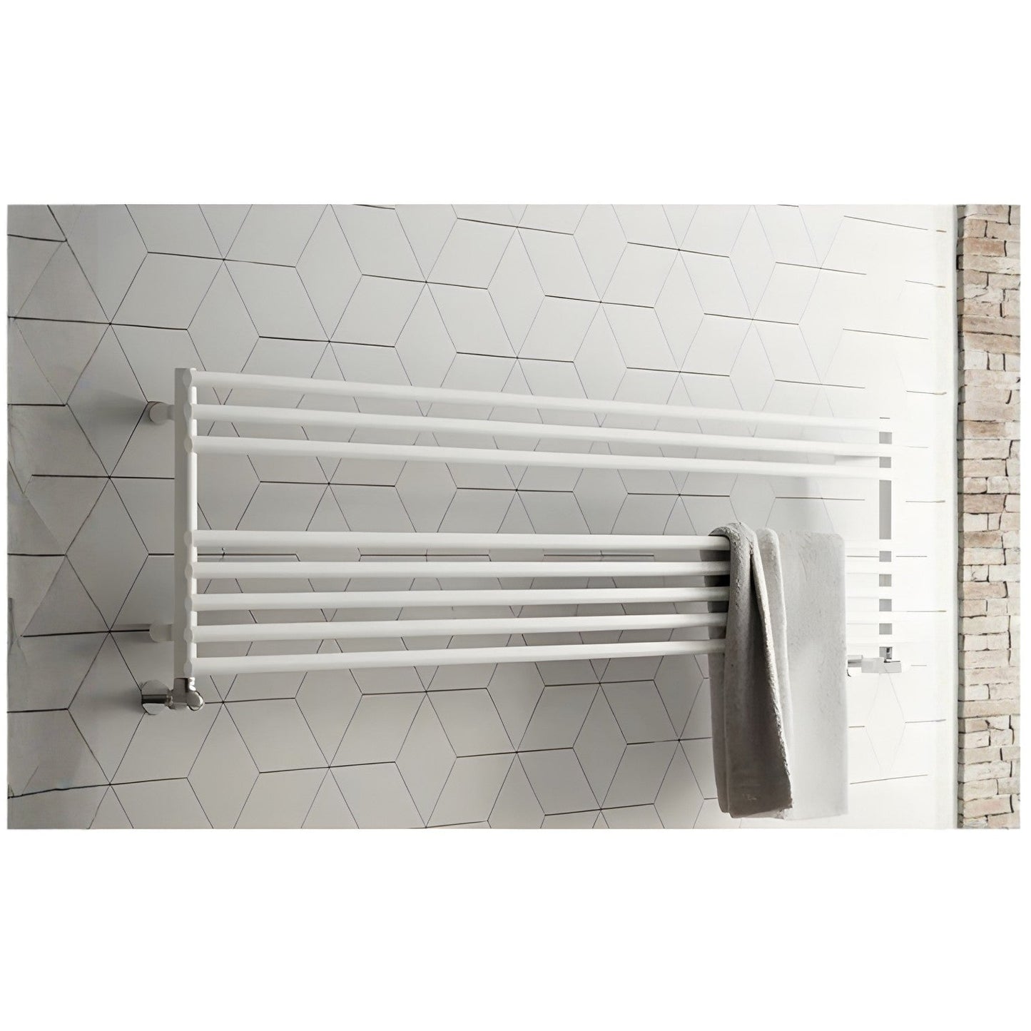 White towel radiator mounted on a tiled bathroom wall with a towel hanging on it.